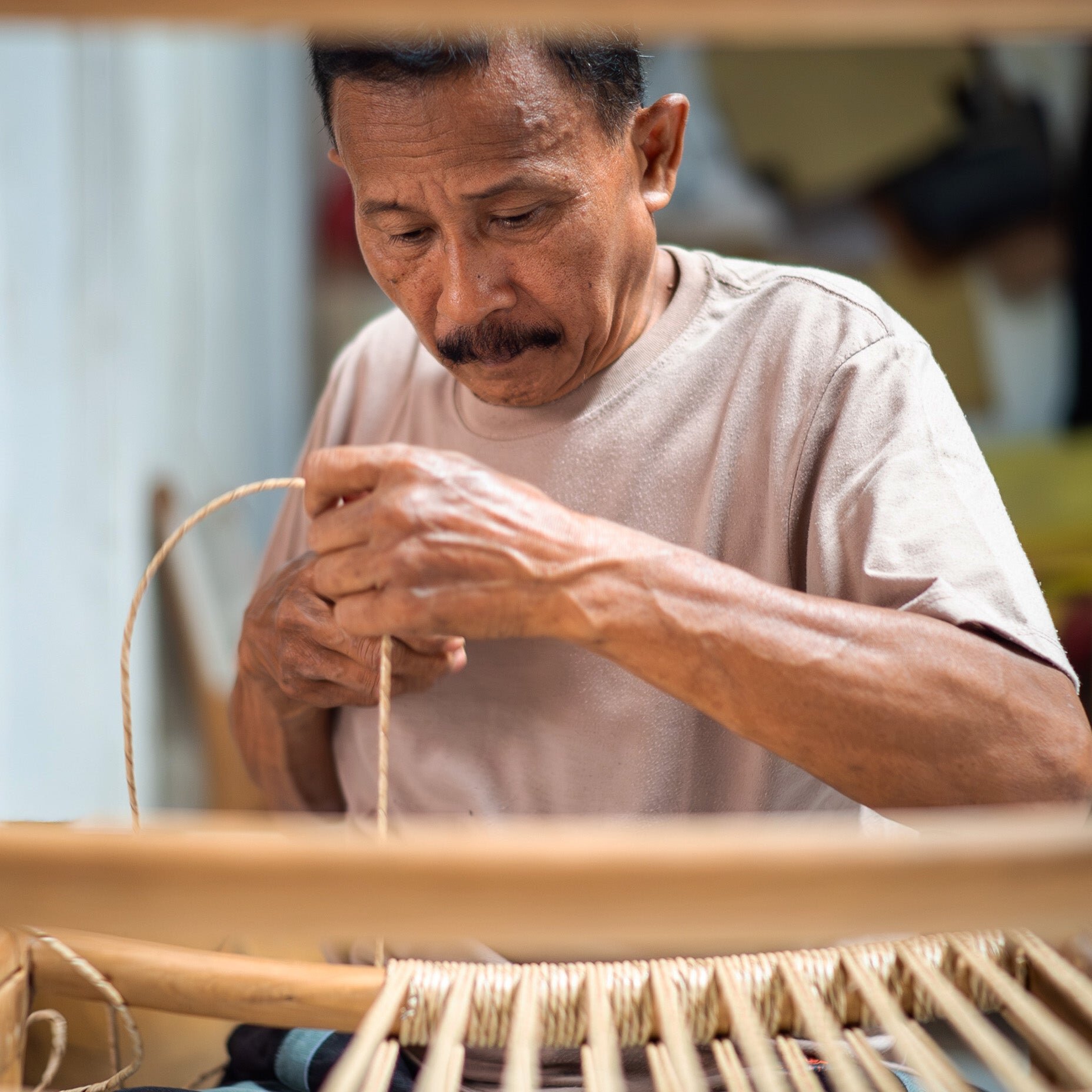 Artisan weaving rattan