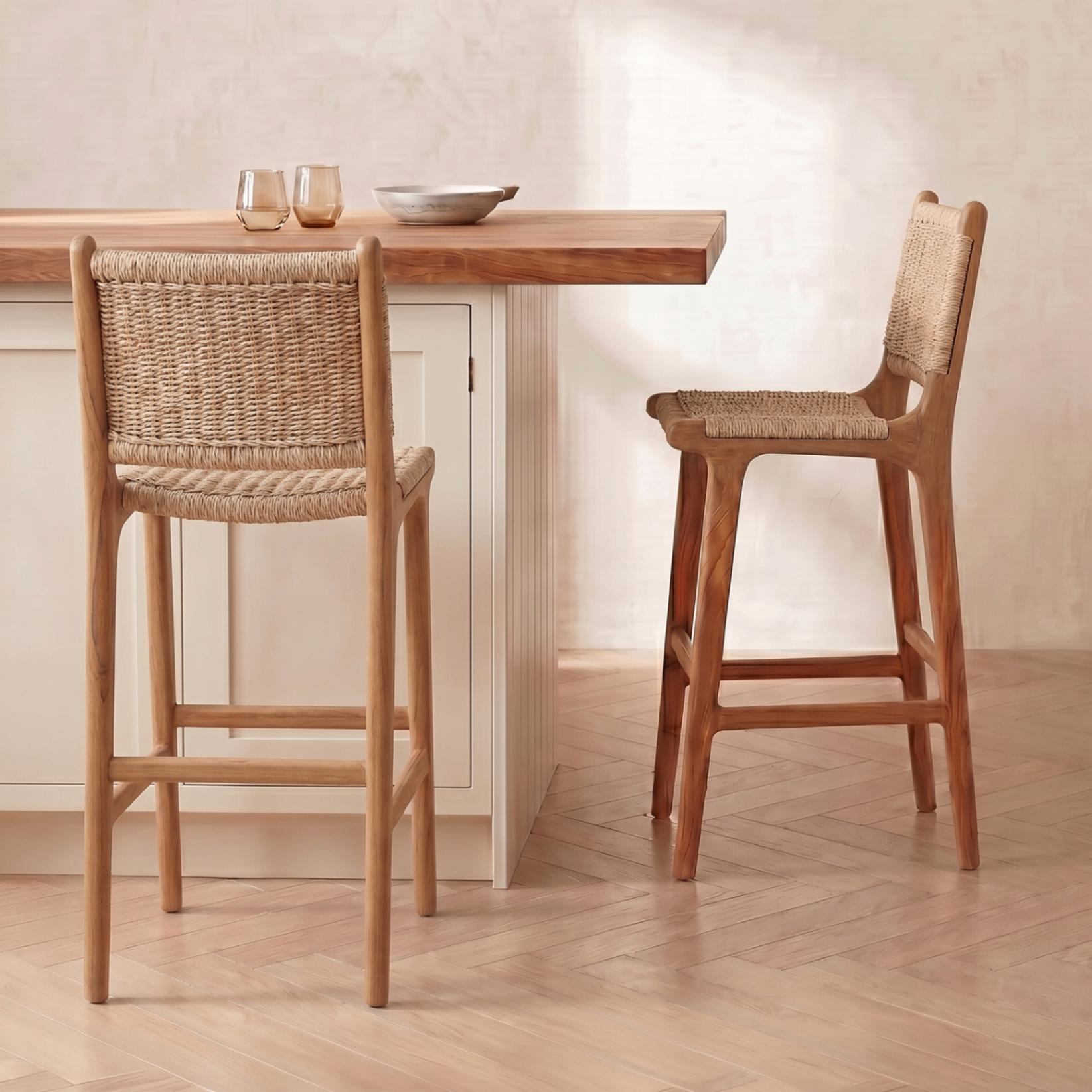 Custom teak and woven bar stools at a kitchen island